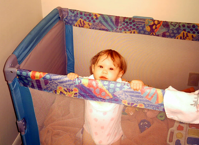 Kaitlyn in playpen