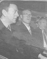 Charged: Abram, centre, leaving court after an earlier hearing