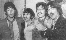Psychedelic: Paul, Ringo, John and George launch Sgt. Pepper's in 1967.