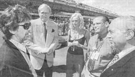 Race talk: Harrison with Ron Walker, Sarah O'Hare, Lachlan Murdoch and Governor Sir James Gobbo at last year's Grand Prix