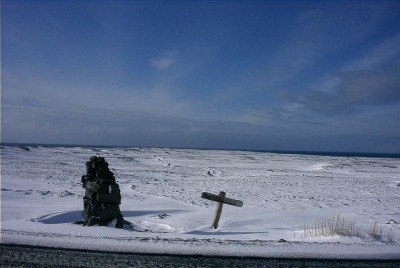 Stone markers leading across the lava field