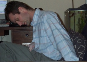 this is kelly, my husband, with Chauncey peeping out his shirt