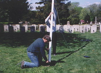 Brothers Mike Kennedy and Dale Wheeler installing the new flagpole at the Civil War Soldiers and Sailors Burial Plot
