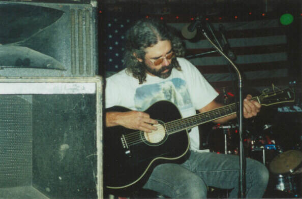 Dale Playing The Song Of Crazy 
Horse while JD looks on