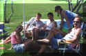 group_under_umbrella_small.jpg (11165 bytes)