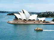 Sydney Opera House with ferry passing