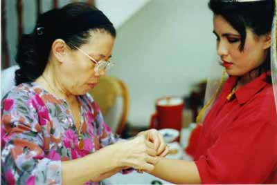 Mum preparing daughter