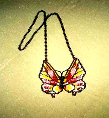 Necklace Butterfly and the link to brief Review of Brenda Starr