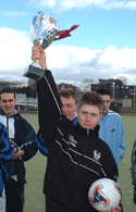 Howard Bailey lifts the JP Challenge Cup