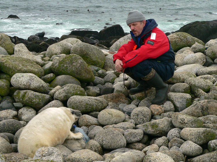 Henri d'Entremont with Grey Seal pup - Ted D'Eon photo - Jan 6, 2006