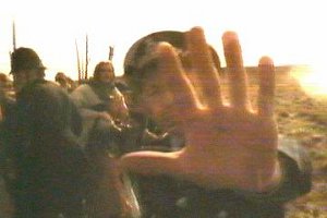 Hand Over Lens