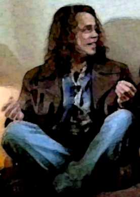 [Blair sitting cross-legged]
