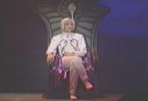 [Upon his throne]