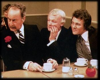 Captain Peacock, Mr Humphries and Mr Lucas strain to overhear a conversation in the canteen....