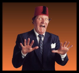 Tommy Cooper in typical pose - not like that, like that ...