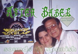 Mr. Gabriel Chavez and me at the Mole 2000. In the background, the poster for his book: Stellar Inheritance