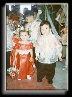 Daniel with girlfriend at a wedding