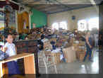 Distributing Donations 3.jpg (517388 bytes)