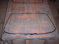 Windshield trim after sandblasting and powdercoating