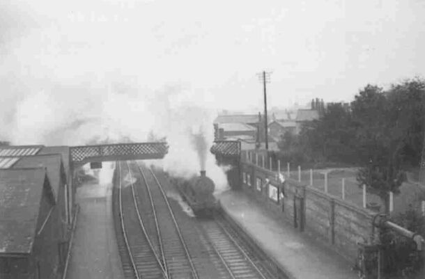 4f on a goods train prepares for the bank as it passes through Bromsgrove station
