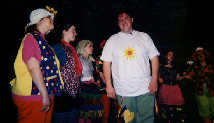 (L to R) Kim Lloyd, Melanie Zix, Steph Streit, Steve Ellis, Lora Robinson, and Blaire Karg sing All Good Gifts.