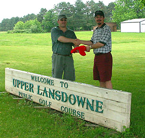 The trophy lobster headcover is passed between champions