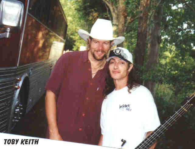 Toby Keith Signing Guitar