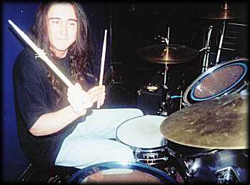 Vincent Playing His Drums.