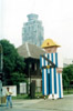 Pedestrian, statue, skyscraper: Rizal Park, Manila, Luzon