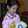 Admiring Her Bear