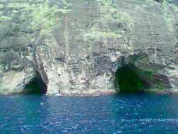 Caves along the mountain waterline