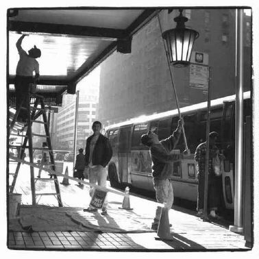 Workers in morning light