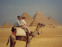 Photo of us on a camel near the pyramids