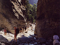 Photo of people walking in the Samaria Gorge in Crete