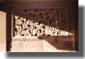 View of carved-through screen wall at enry to Health Spa