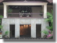 Rear elevation of Spa with stone carved wall illuminated