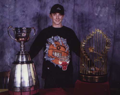 Me with the Grey Cup and World Series trophies @ Iroquois Park.