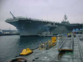 The USS Kittyhawk, one of our aircraft carriers, pulling into Sub Base, Yokosuka, Japan.  Click to enlarge.