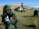 Chinese border soldiers shoot at "terrorists." in the China-Kyrgyzstan anti-terror military exercises which concluded on October 11, 2002. The two-day joint anti-terrorism military exercises took place in the border regions of the two countries. [Xinhua] 