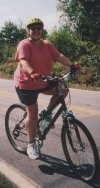 Tracey on her bike at the Alexander bridge over the French Broad River. Fall 2002.