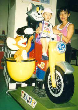 Playing with Tom & Jerry bike
