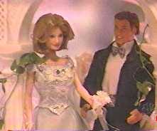John and Marlena Dolls on their Wedding Cake 1999