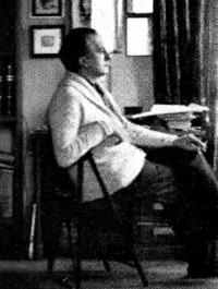Eluard dans sa bibliotèque, 1936