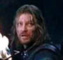 Boromir in Moria holding a fackle