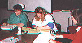 HIM students studying