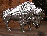 A buffalo sculpture made out of car bumpers and other pices of chrome: Canon City, CO