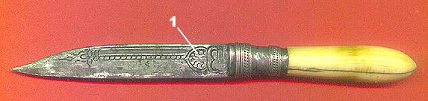 knifed1m.jpeg (17871 bytes)