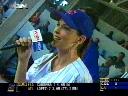 Shania sings 'Take Me Out To The Ball Game' during the seventh inning stretch of the Chicago Cubs vs Philadelphia Phillies game at Wrigley Field in Chicago, Thursday, July 24, 2003