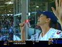 Shania sings 'Take Me Out To The Ball Game' during the seventh inning stretch of the Chicago Cubs vs Philadelphia Phillies game at Wrigley Field in Chicago, Thursday, July 24, 2003