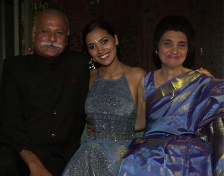 Lara with her proud parents